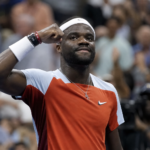 Frances Tiafoe celebrates after his latest U.S. Open win