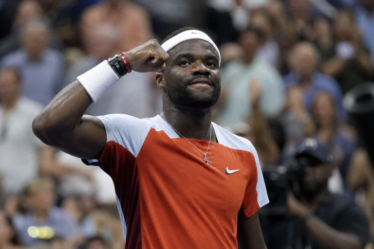 Frances Tiafoe celebrates after his latest U.S. Open win